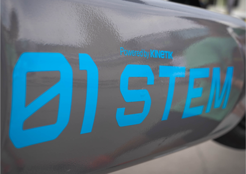 The side of the kart with label 'Powered by KINETIK 01 STEM'